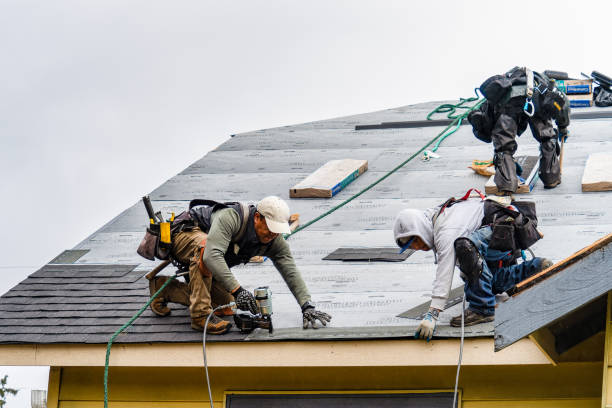 Professional Gutter Installation technician working in Marble Falls, TX